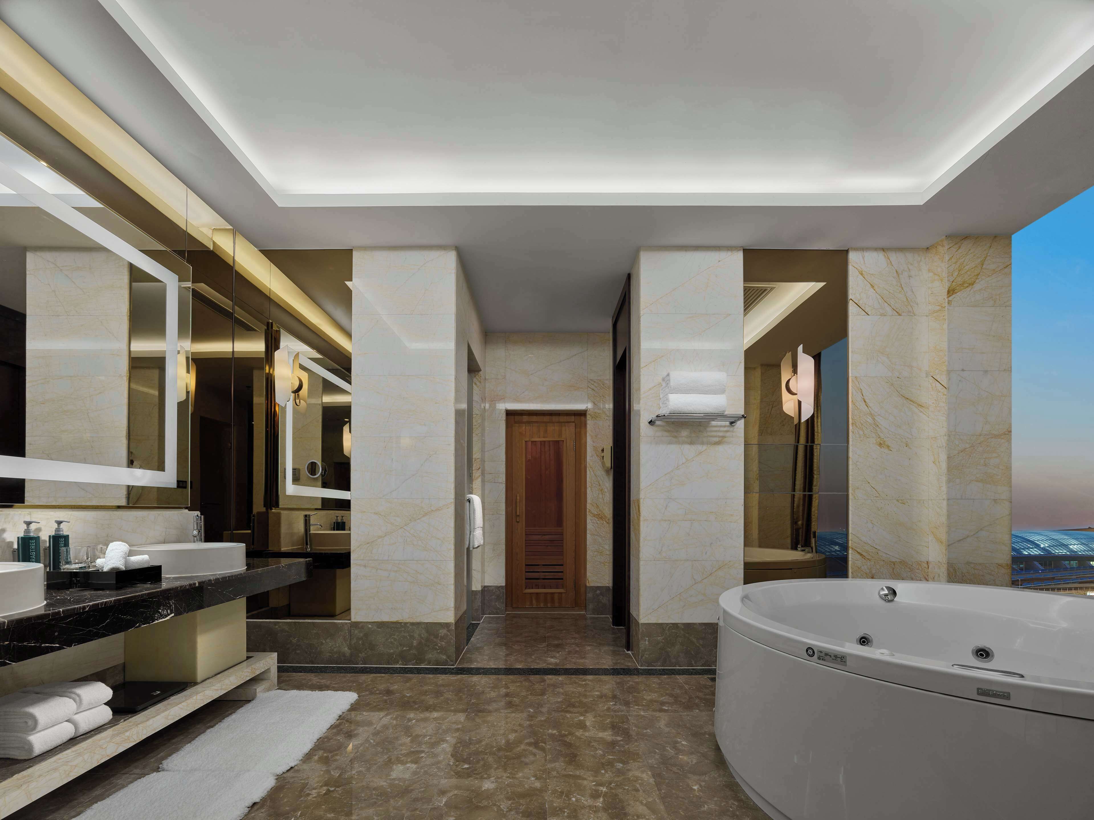 presidential suite | bathroom | separate bathtub and shower, deep-soaking bathtub, rainfall showerhead