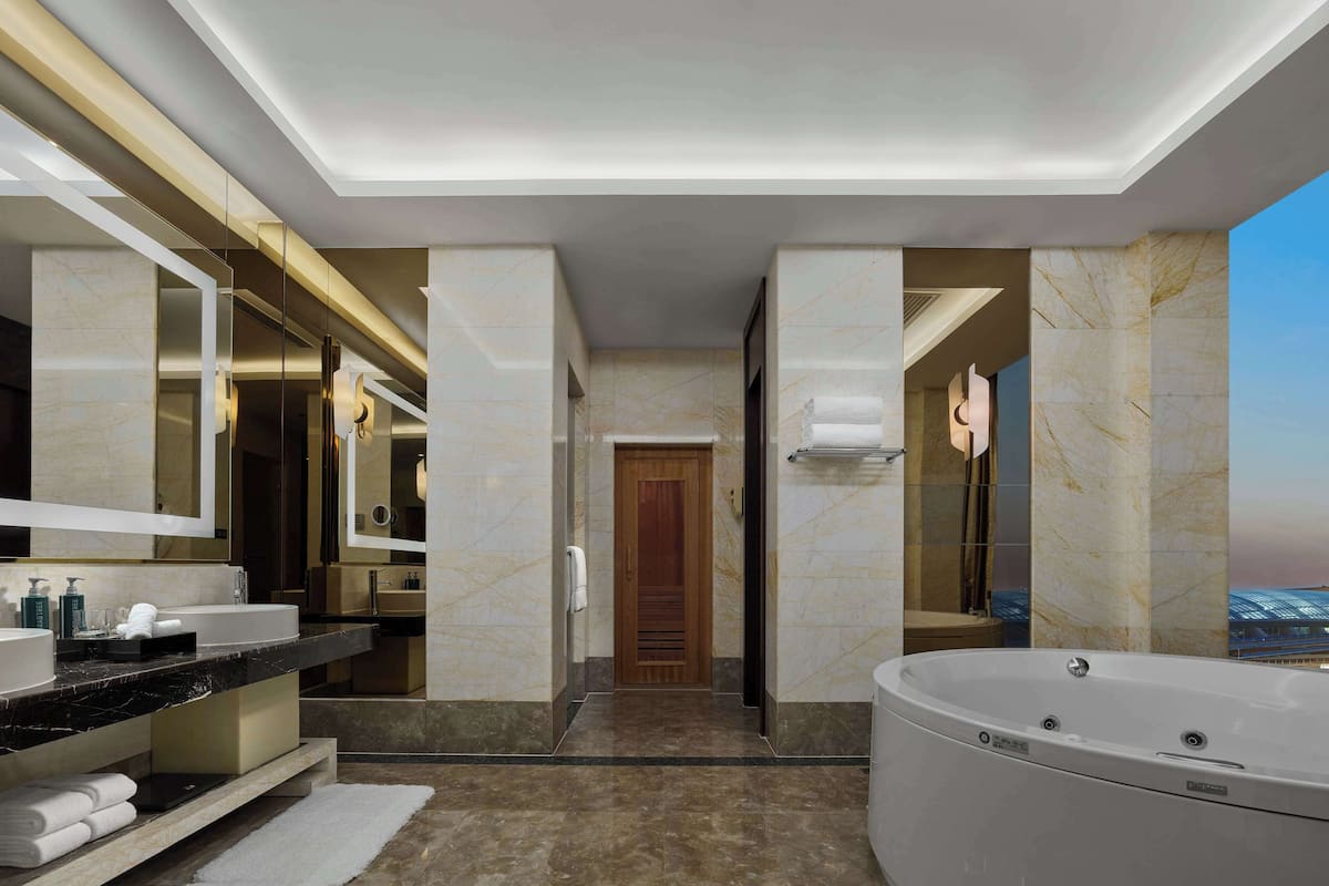 presidential suite | bathroom | separate bathtub and shower, deep-soaking bathtub, rainfall showerhead
