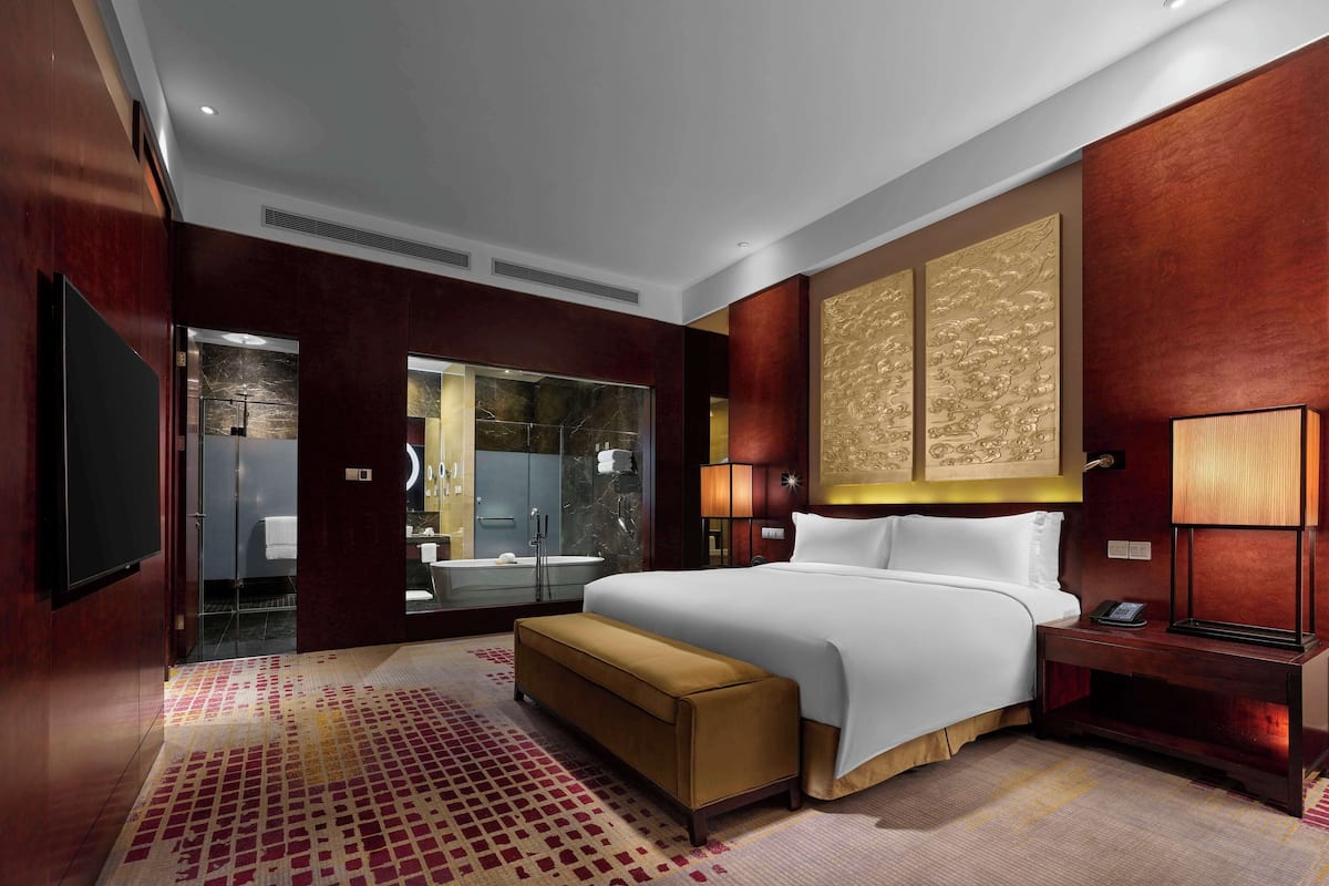 Premium bedding, down duvets, memory-foam beds, minibar