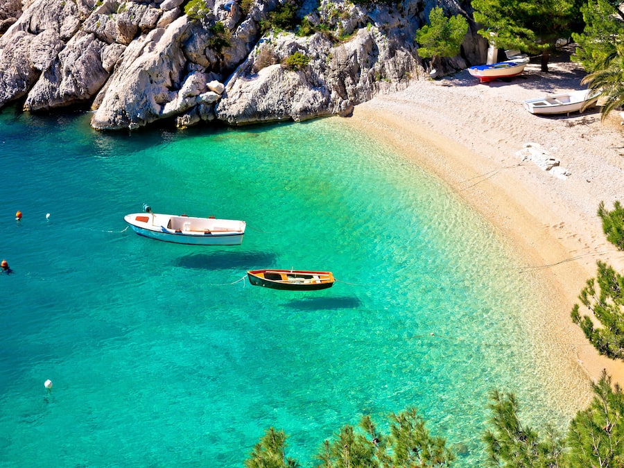 On the beach, sun loungers, beach umbrellas