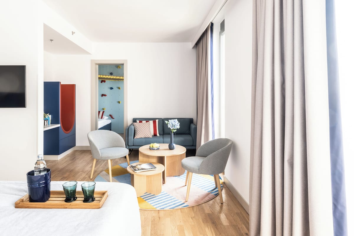 Family Suite, 2 Bedrooms, Balcony, Partial Sea View | Living area
