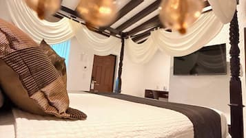 Premium bedding, down comforters, in-room safe, desk