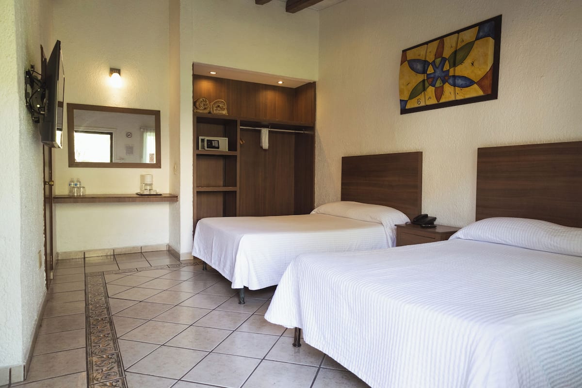Premium bedding, down duvets, in-room safe, desk