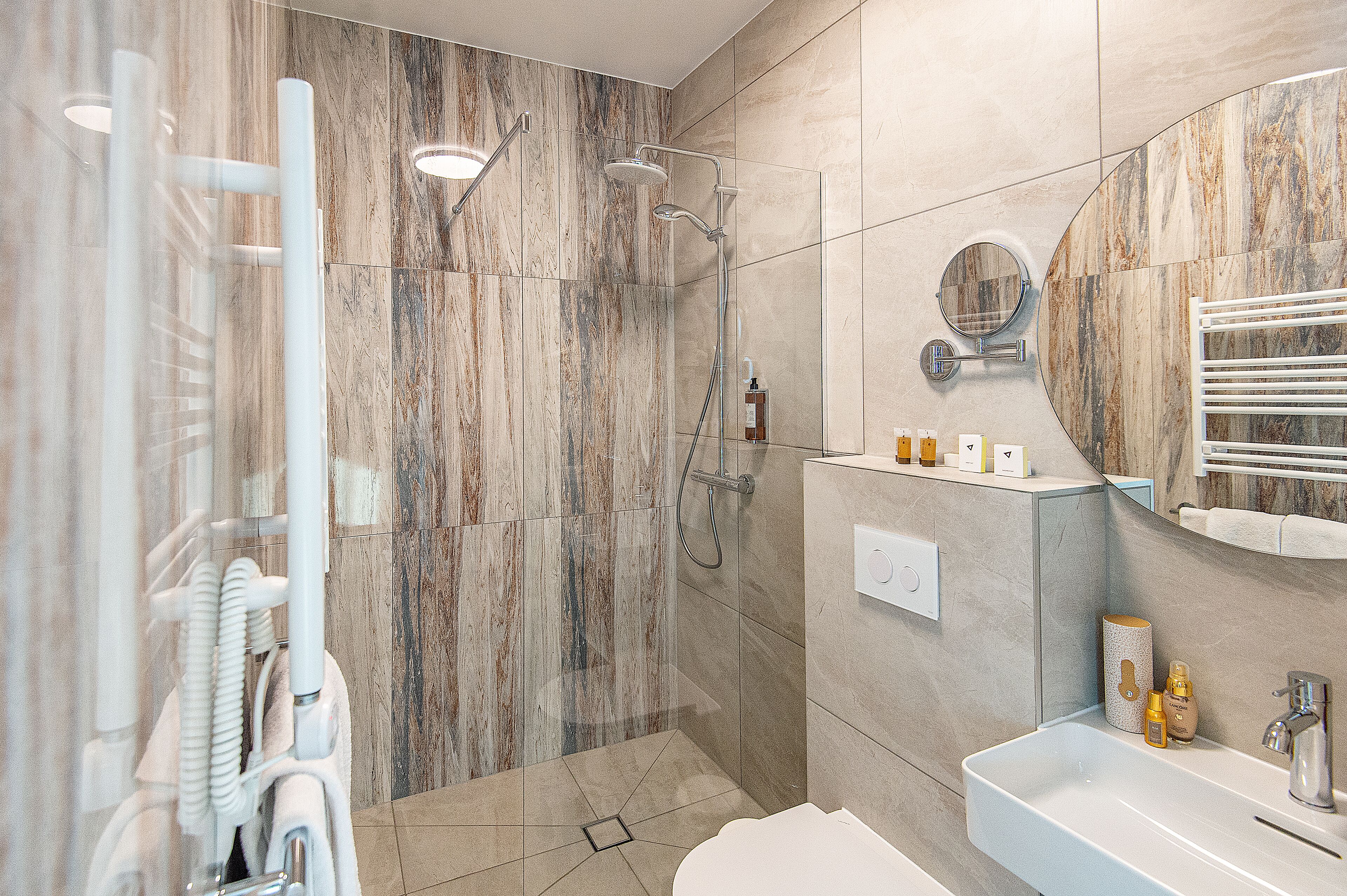 shower, free toiletries, hair dryer, towels