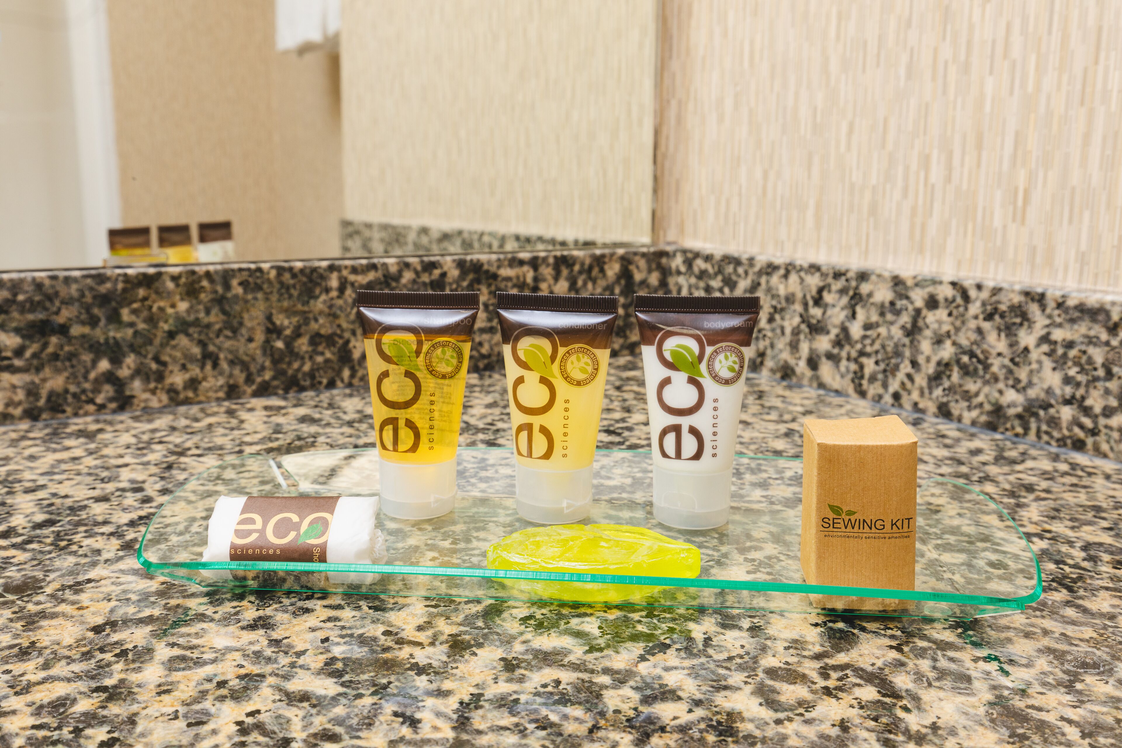 combined shower/bathtub, designer toiletries, hair dryer, towels