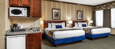 Deluxe Room, 2 King Beds | Pillowtop beds, individually decorated, individually furnished, desk