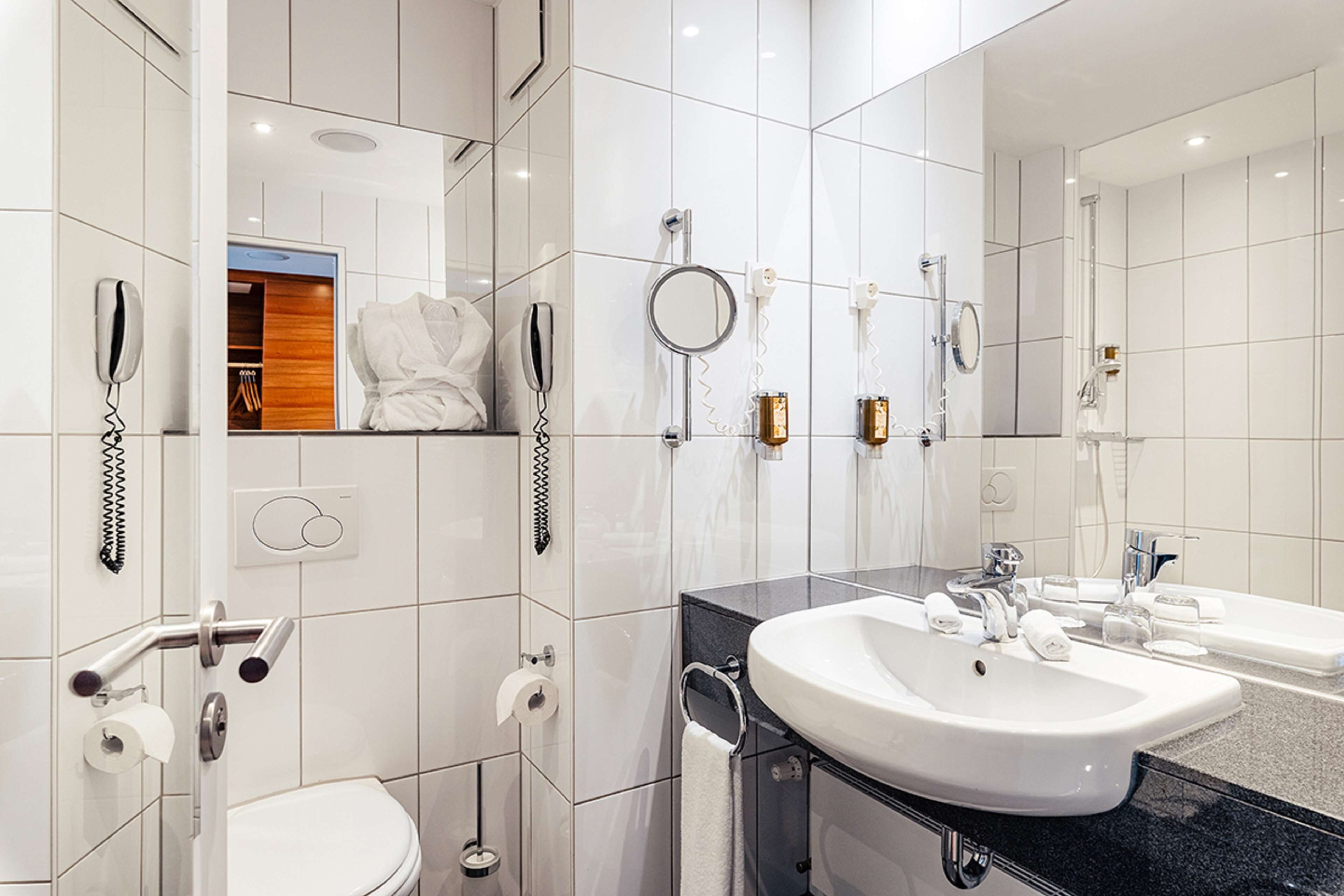 superior room, 1 king bed | bathroom | free toiletries, hair dryer, bathrobes, slippers