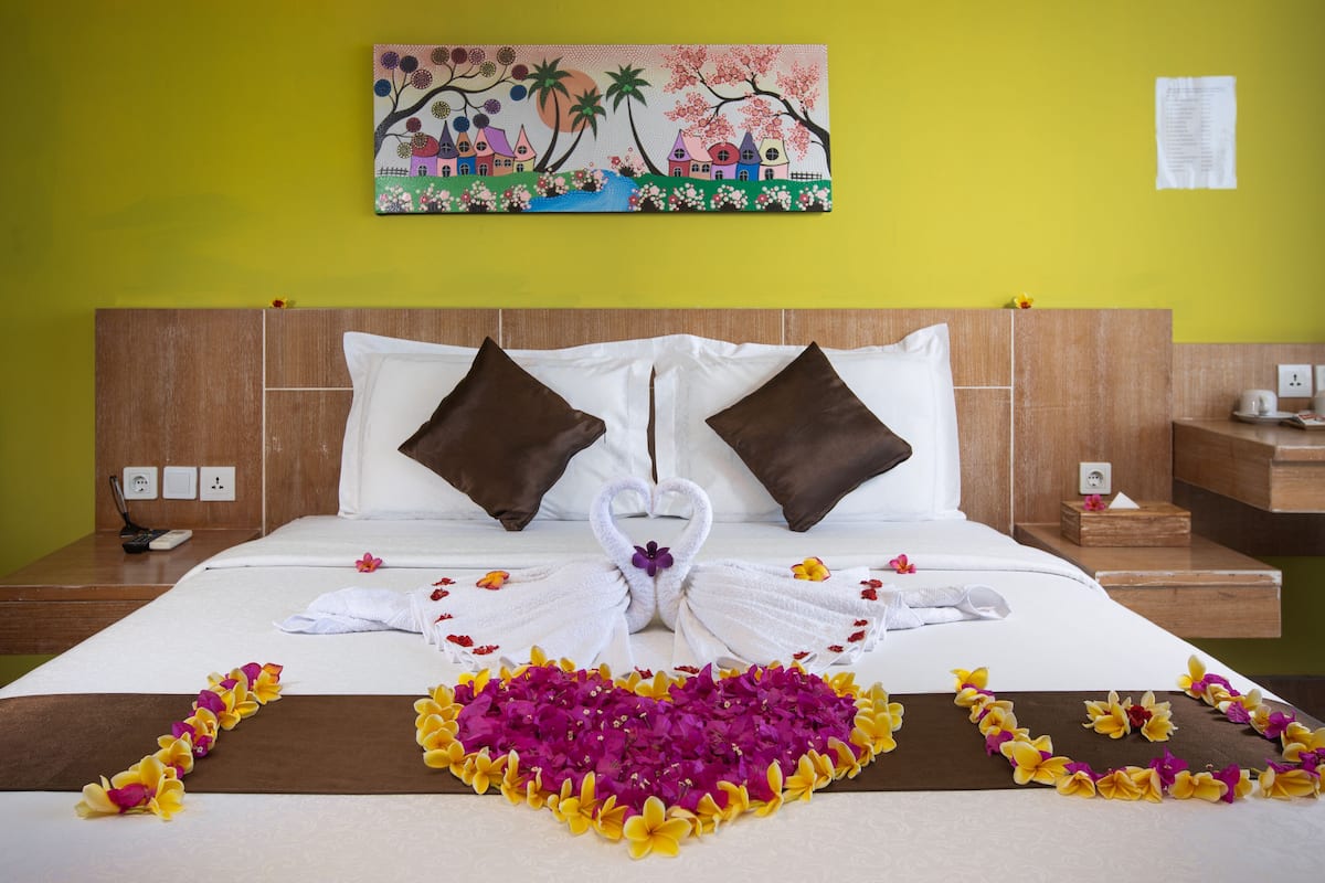 Deluxe Double Room, Ocean View | 1 bedroom, in-room safe, free WiFi, bed sheets