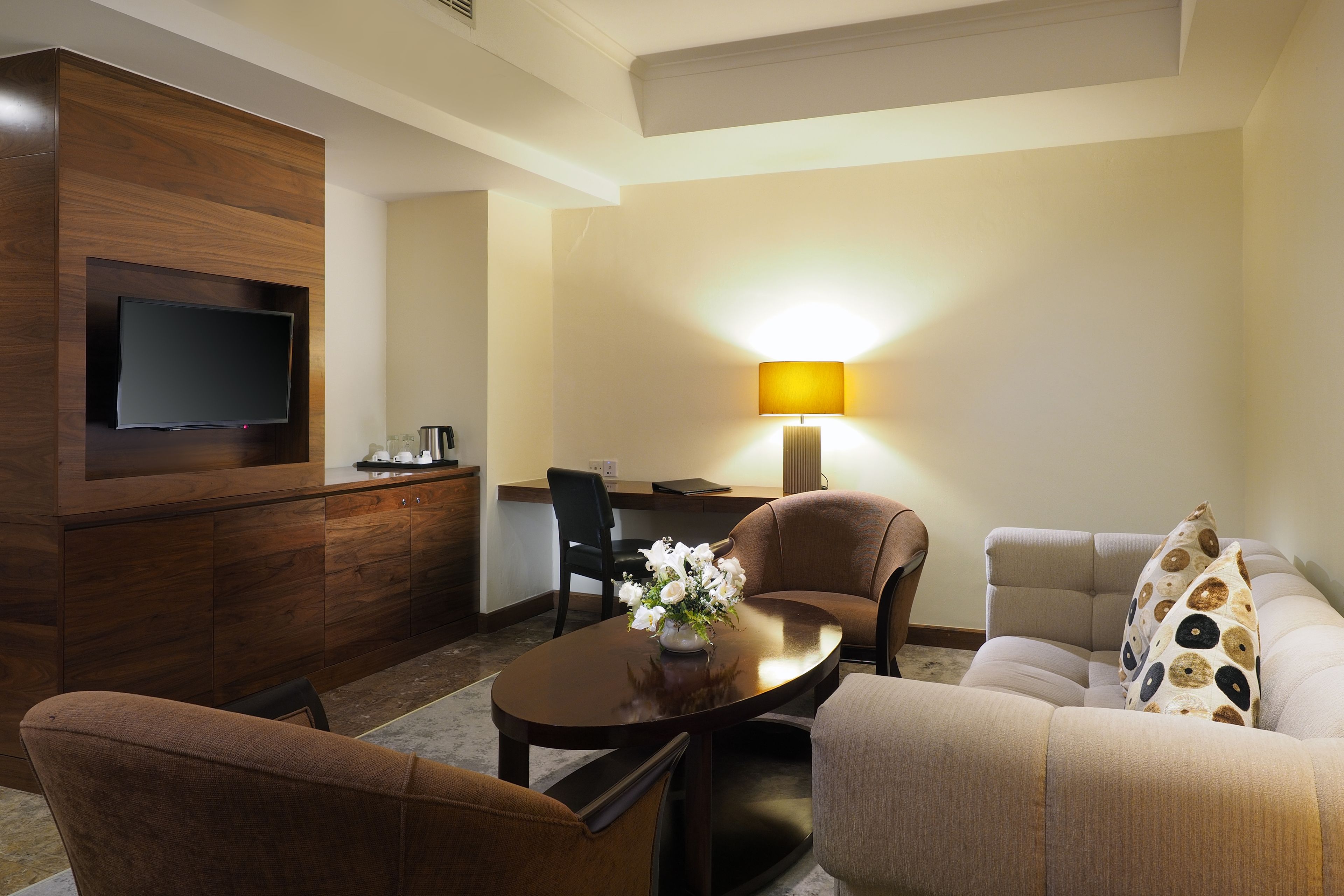 arya suite | living room | 32-inch lcd tv with satellite channels, tv