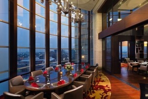 Breakfast, lunch, dinner served; international cuisine, pool views 