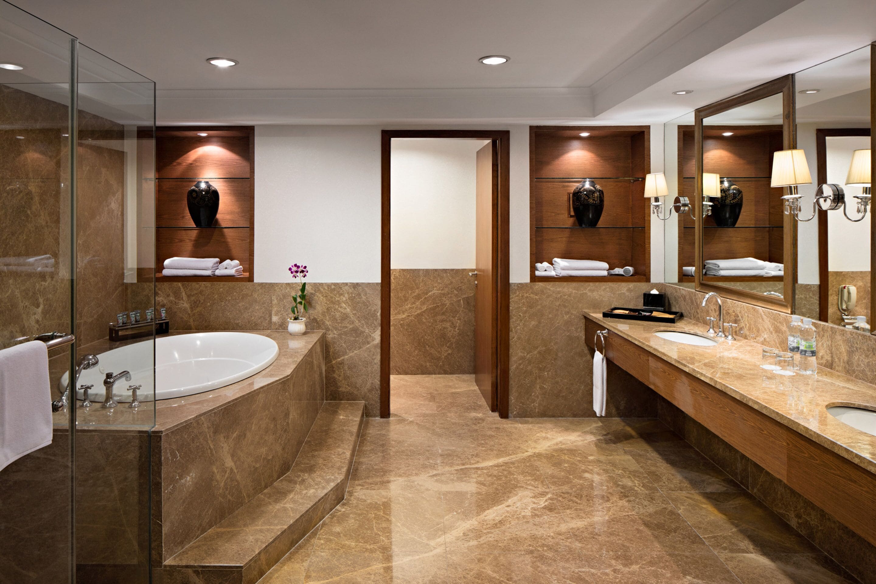 aryaduta suite | bathroom | shower, free toiletries, hair dryer, bathrobes