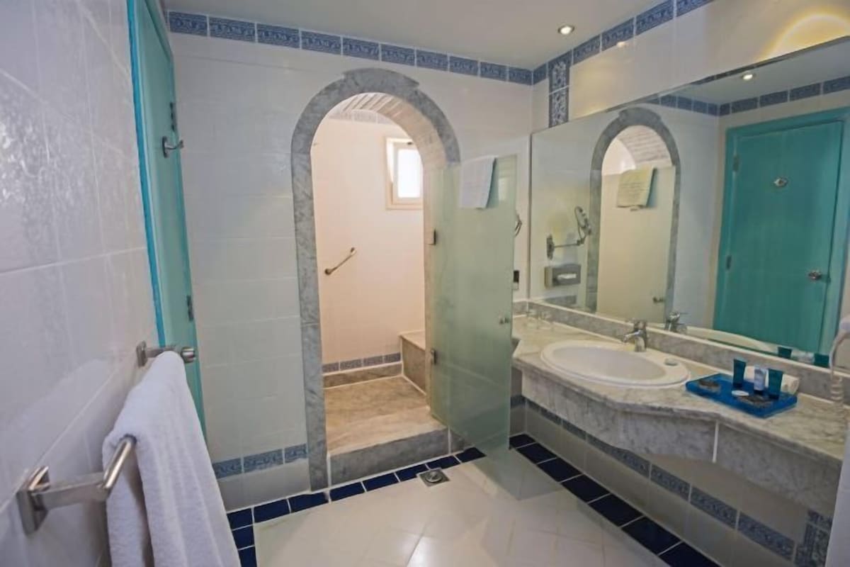 Bathroom | Shower, free toiletries, hair dryer, towels