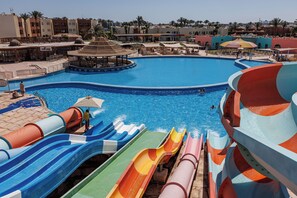 A water park with multiple slides and a large pool. - SUNRISE Royal Makadi Resort - All inclusive (Makadi Bay)