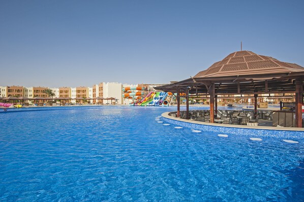 8 outdoor pools, pool umbrellas, pool loungers