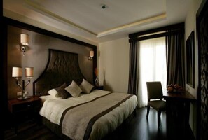 Sábanas de algodón egipcio, camas con pillow-top y minibar 