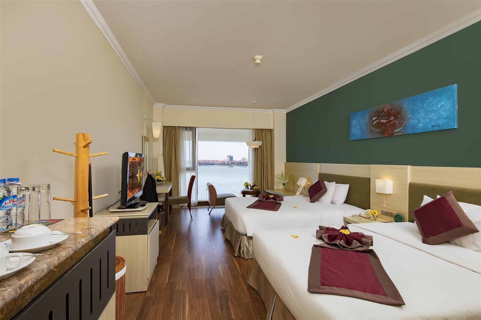 Deluxe Double Room, River View | Minibar, desk, blackout drapes, rollaway beds