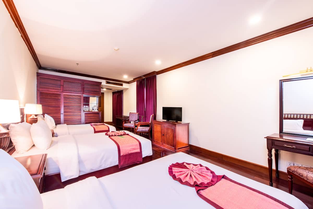 Habitación triple Deluxe | 1 dormitorio, ropa de cama de alta calidad, colchones Tempur-Pedic