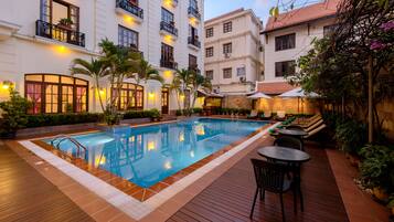 Outdoor pool, pool umbrellas, pool loungers