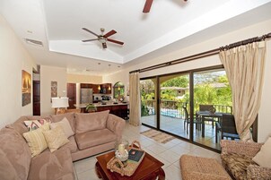 Condo, 2 Bedrooms, 2 Bathrooms | Living room | 32-inch TV with cable channels