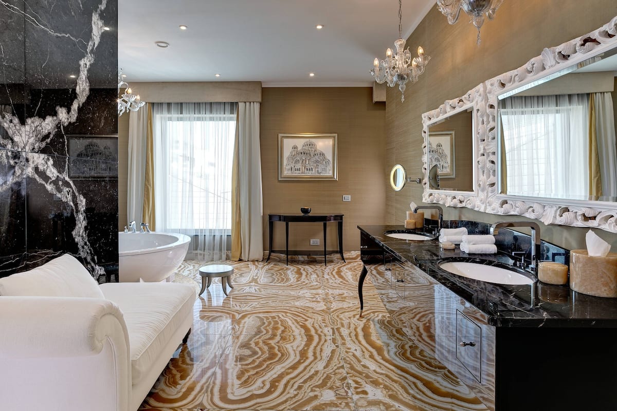 presidential suite, 1 king bed | bathroom | separate bathtub and shower, rainfall showerhead, free toiletries