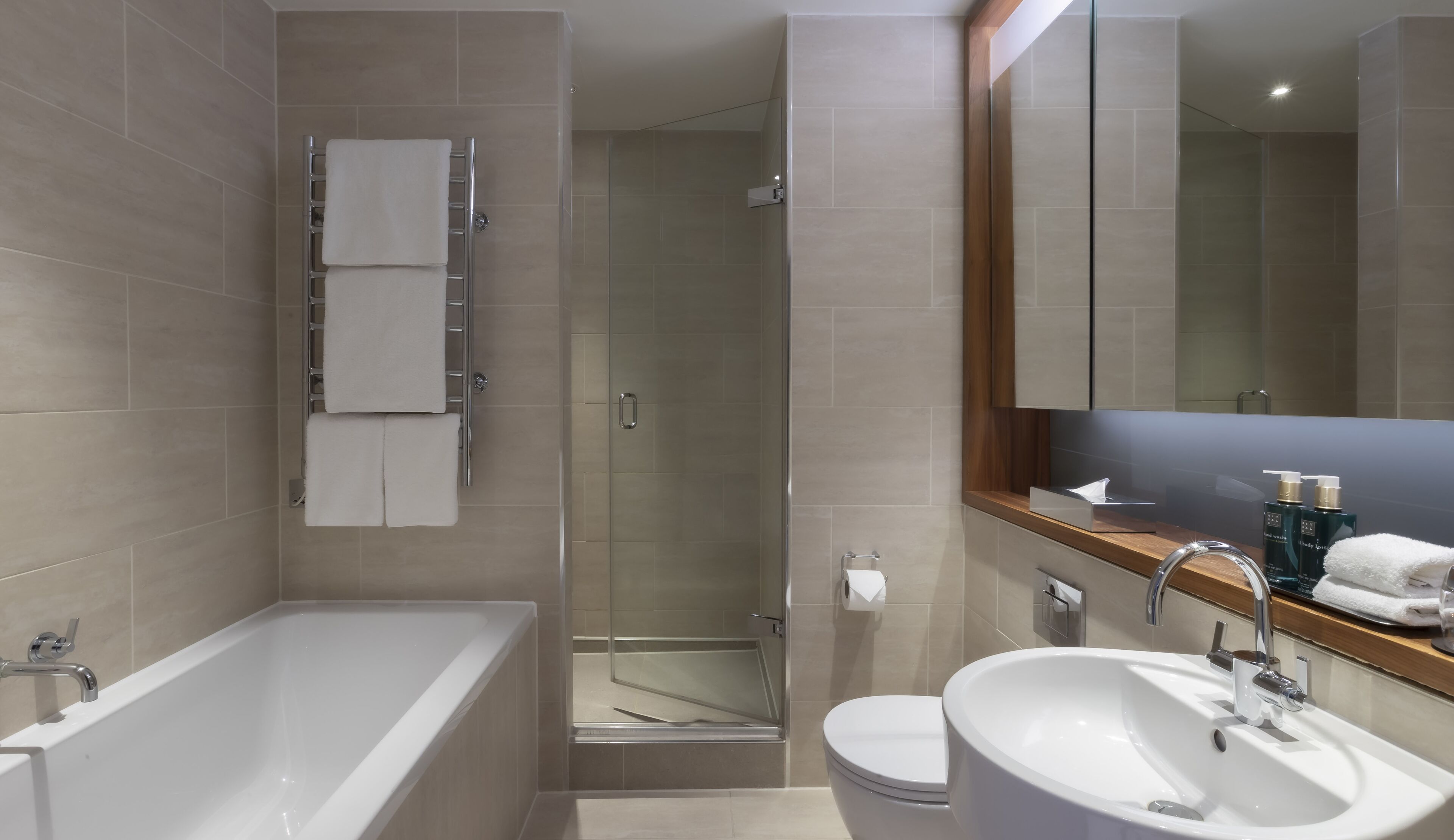 hair dryer, slippers, towels, soap