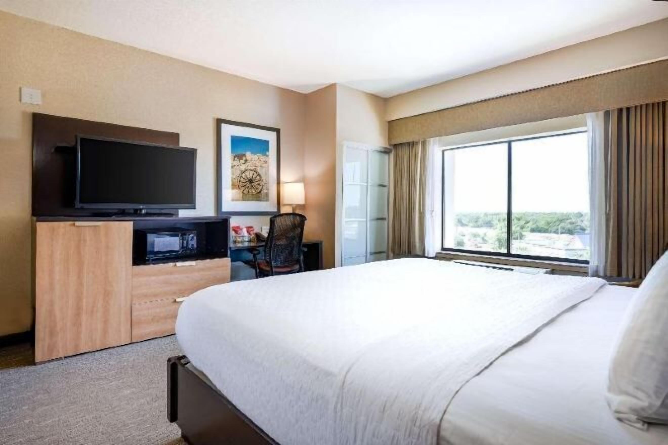 Hypo-allergenic bedding, pillow-top beds, in-room safe, desk