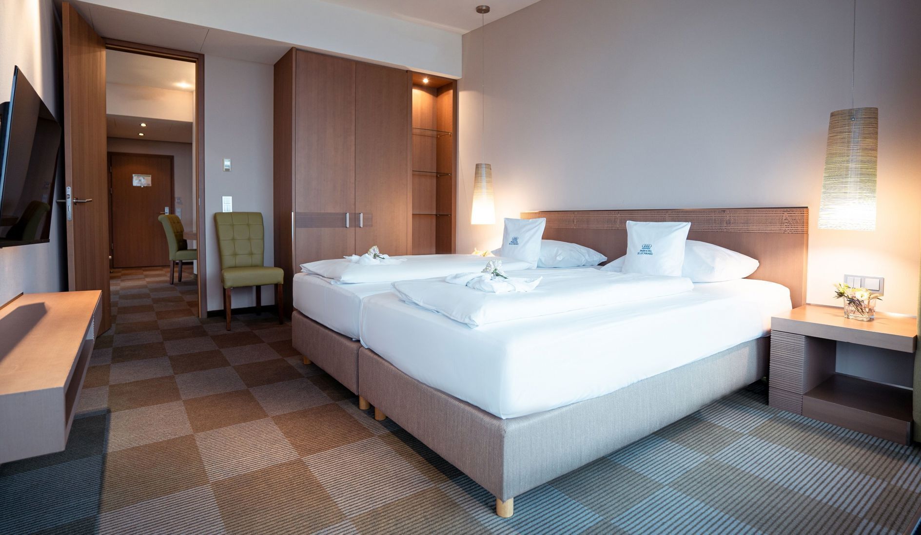 Hypo-allergenic bedding, free minibar items, in-room safe