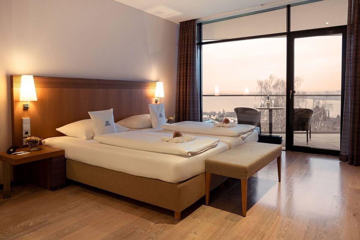 Hypo-allergenic bedding, free minibar items, in-room safe