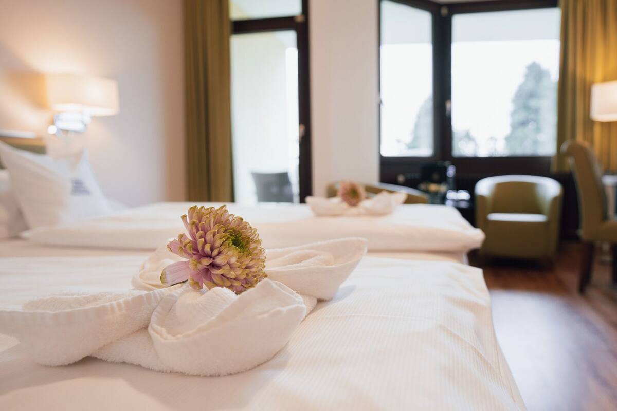 Hypo-allergenic bedding, free minibar items, in-room safe