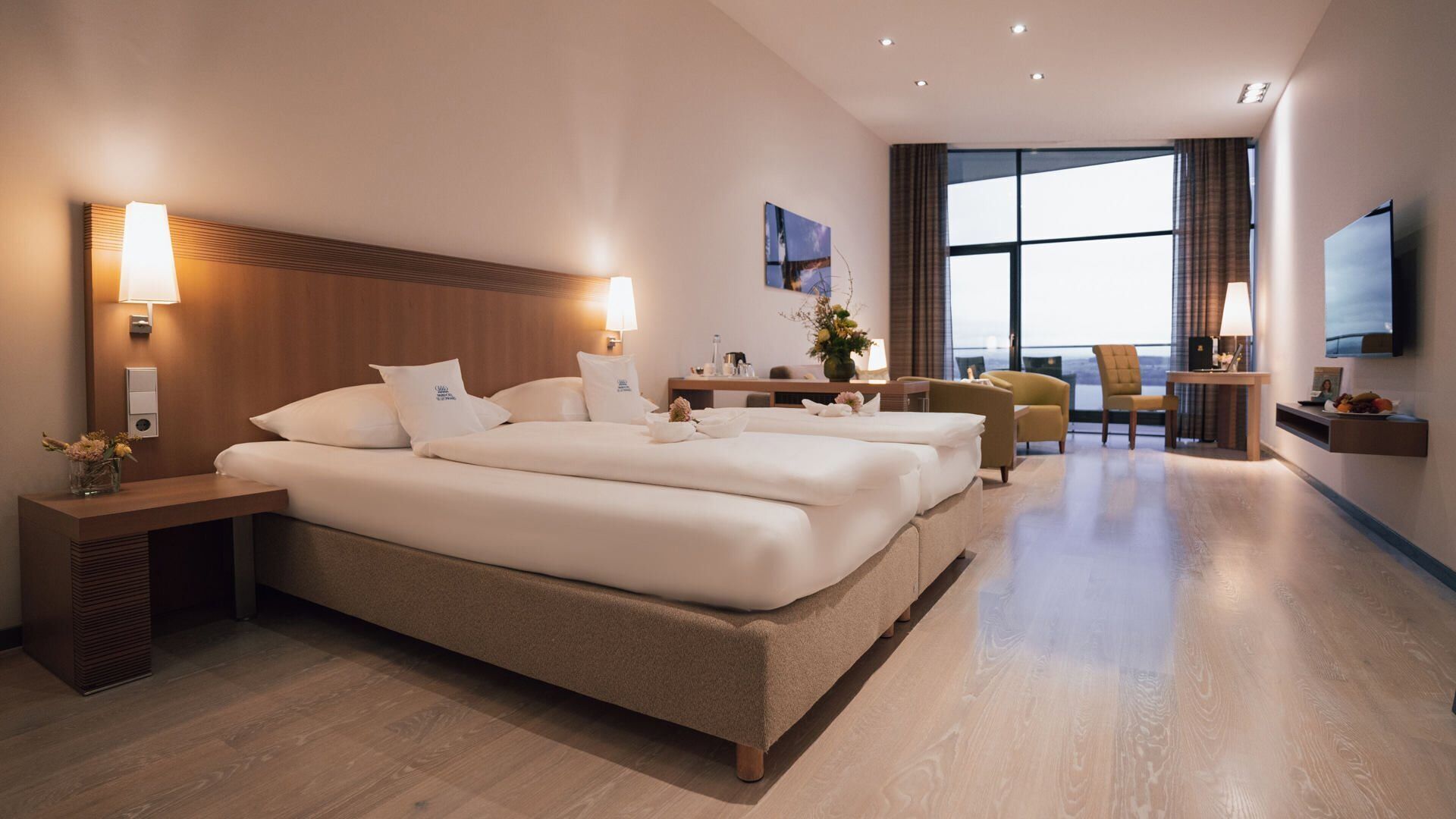 Hypo-allergenic bedding, free minibar items, in-room safe