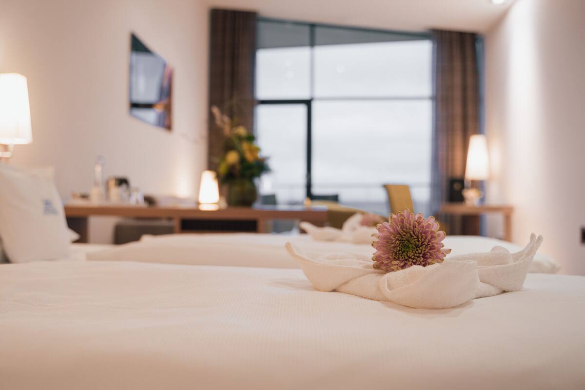 junior suite, lake view | 2 bedrooms, hypo-allergenic bedding, free minibar items, in-room safe