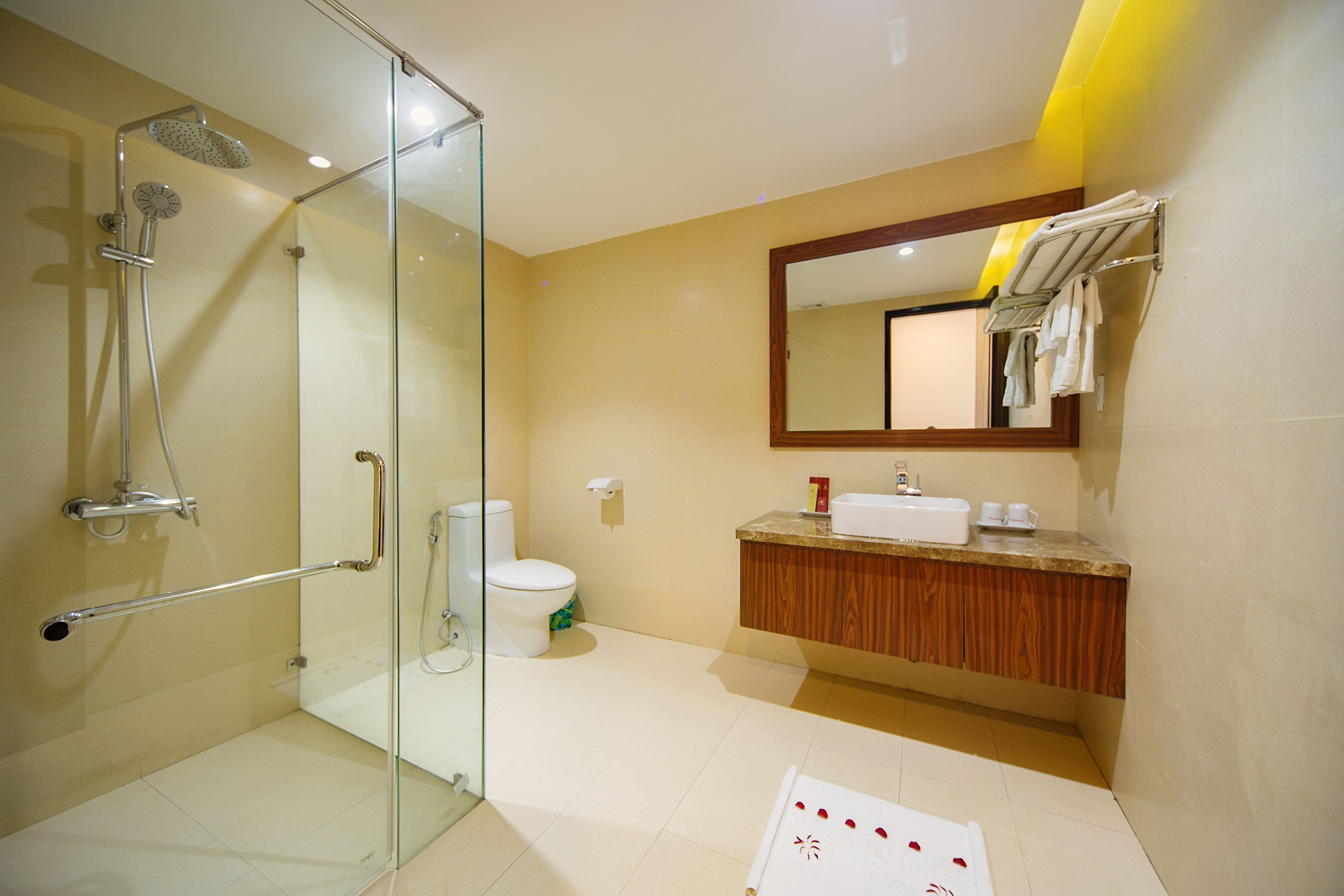 standard room | bathroom amenities | shower, rainfall showerhead, hair dryer, slippers