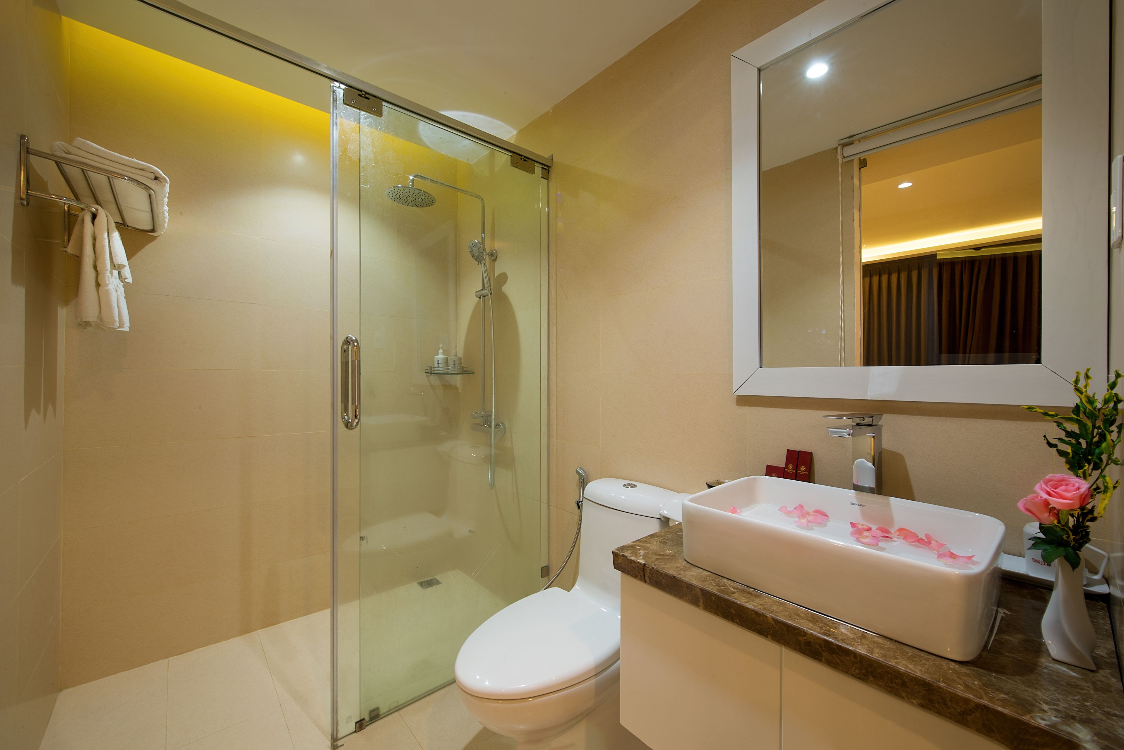superior room | bathroom | shower, rainfall showerhead, hair dryer, slippers