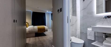 Shower, free toiletries, hair dryer, towels
