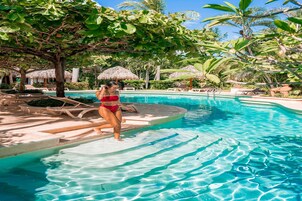 Outdoor pool, free cabanas, pool umbrellas