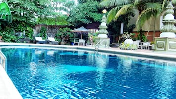 Outdoor pool, pool umbrellas, sun loungers