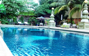 Outdoor pool, pool umbrellas, pool loungers