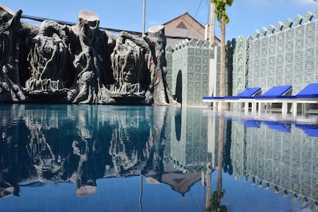 2 outdoor pools. The Suite By Royal Crown Hotel