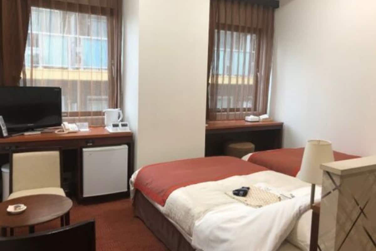 Down duvets, pillow-top beds, desk, blackout curtains
