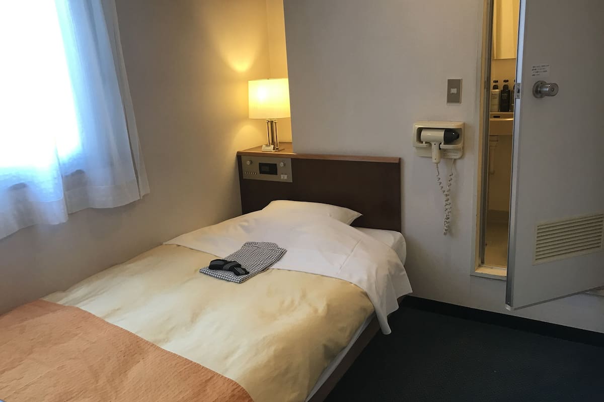 Down duvets, pillow-top beds, desk, blackout curtains