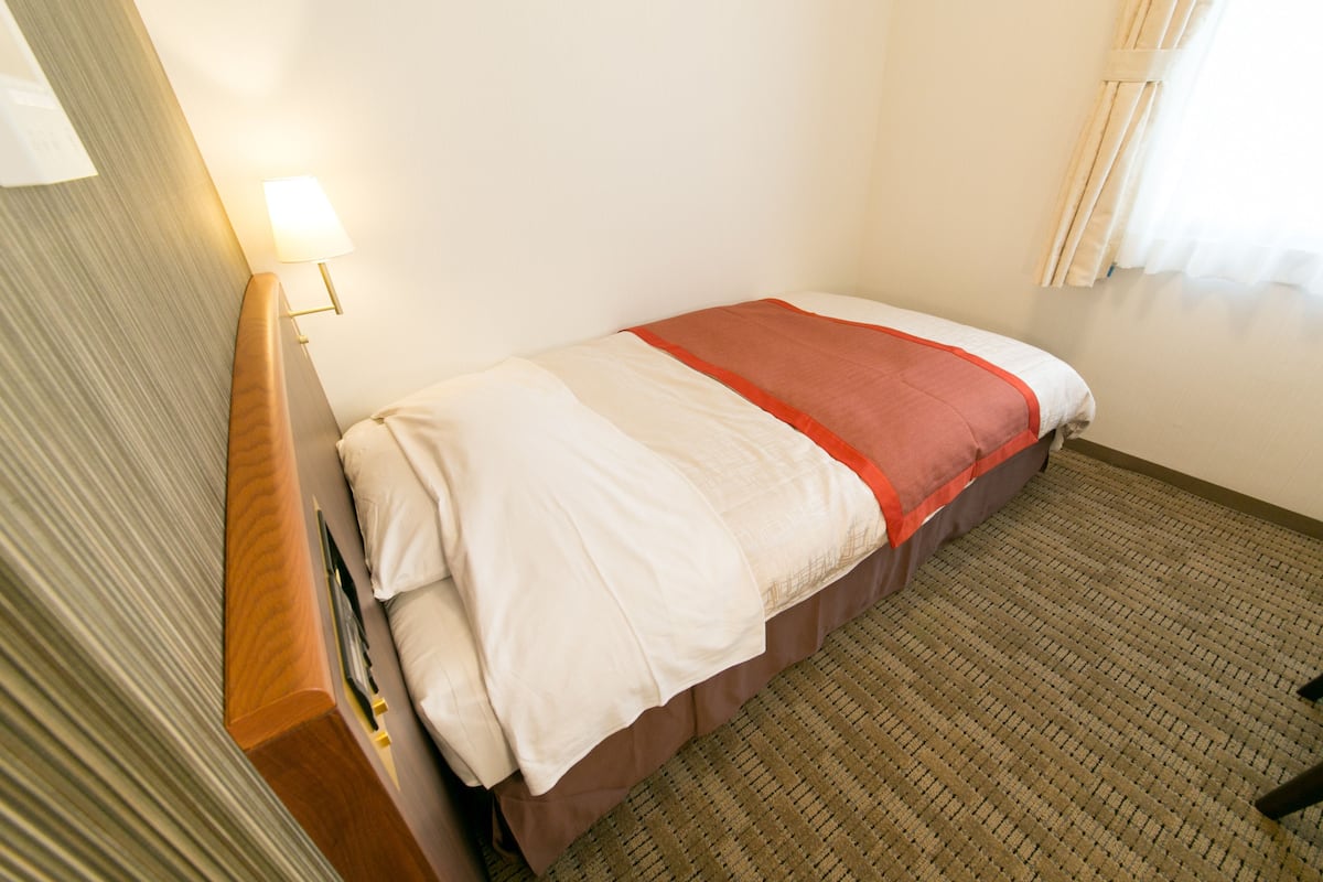 Down duvets, pillow-top beds, desk, blackout curtains