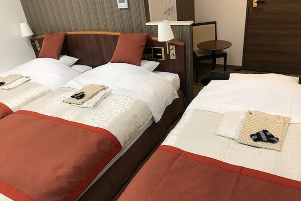 Down duvets, pillow-top beds, desk, blackout curtains