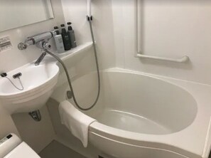 Ensemble douche/baignoire, articles de toilette gratuits, sèche-cheveux