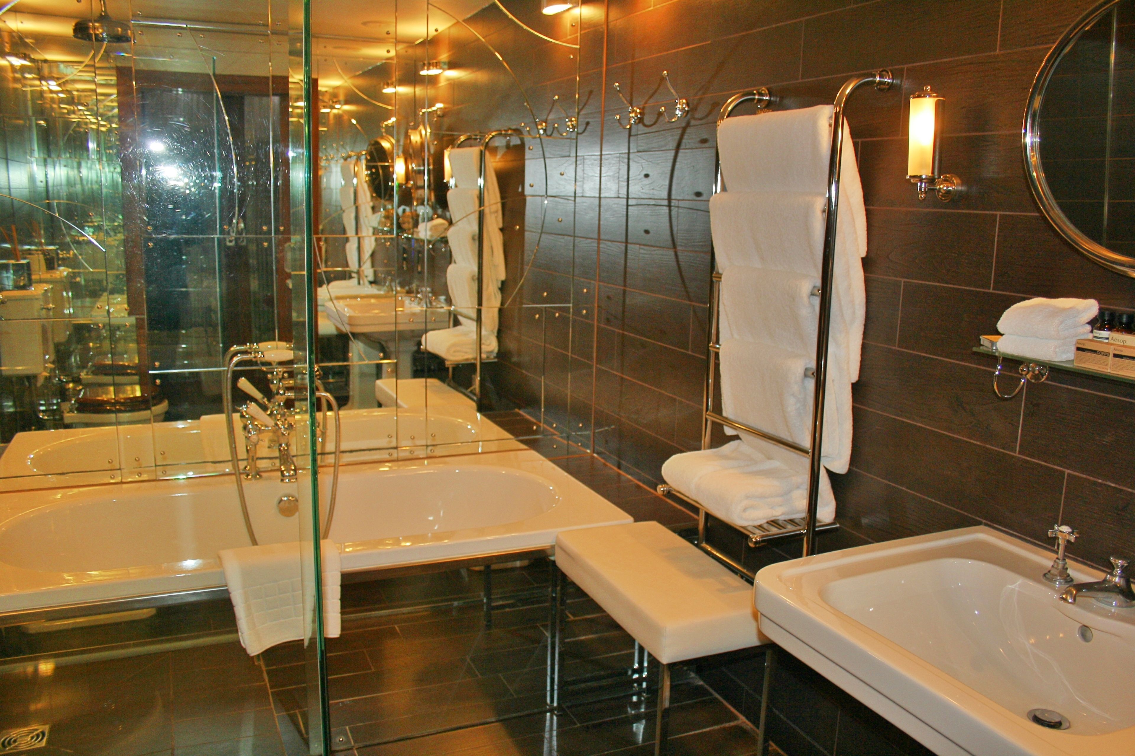 sir david tang suite | bathroom | designer toiletries, hair dryer, bathrobes, slippers