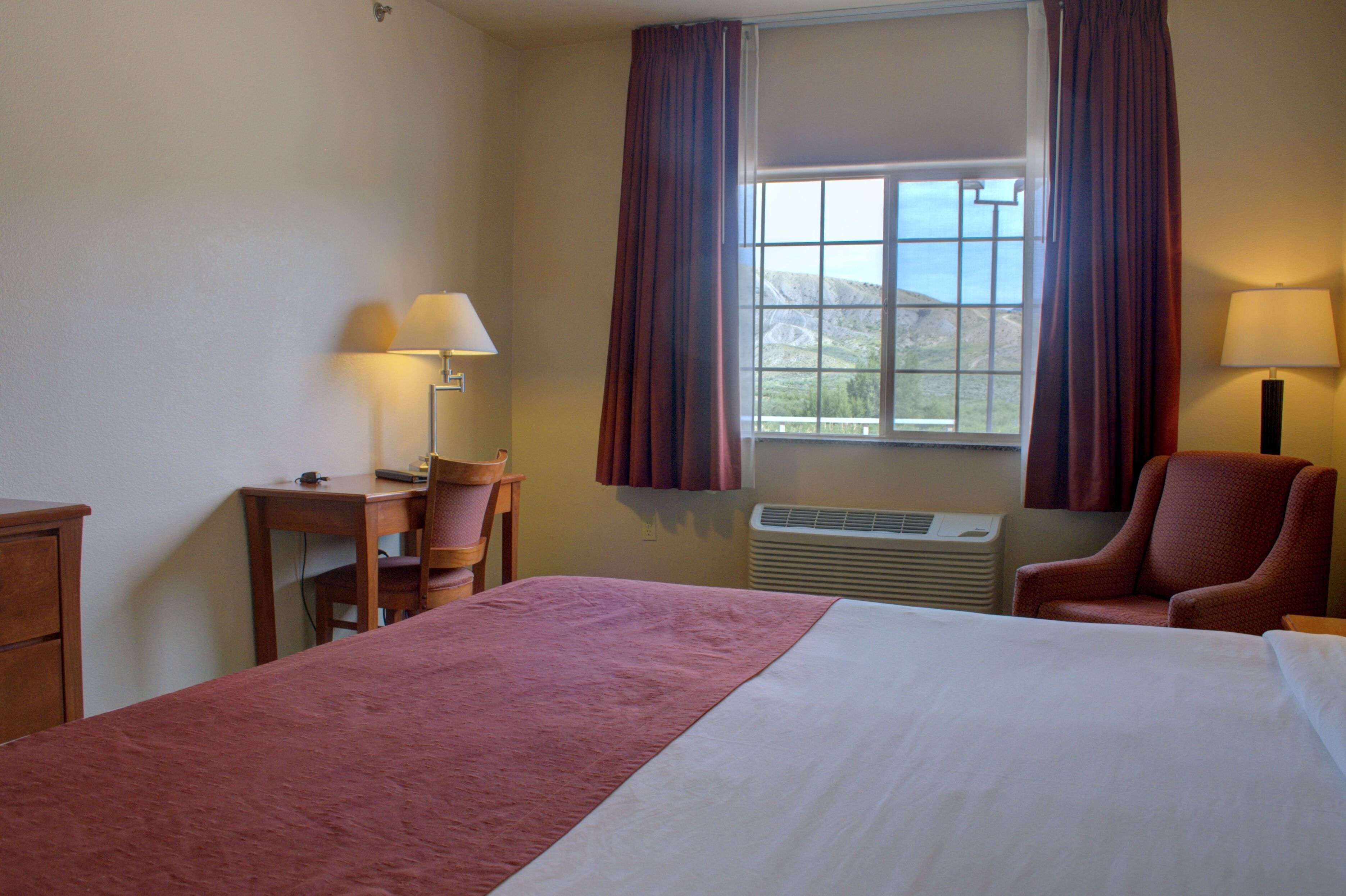 deluxe room | laptop workspace, blackout curtains, iron/ironing board