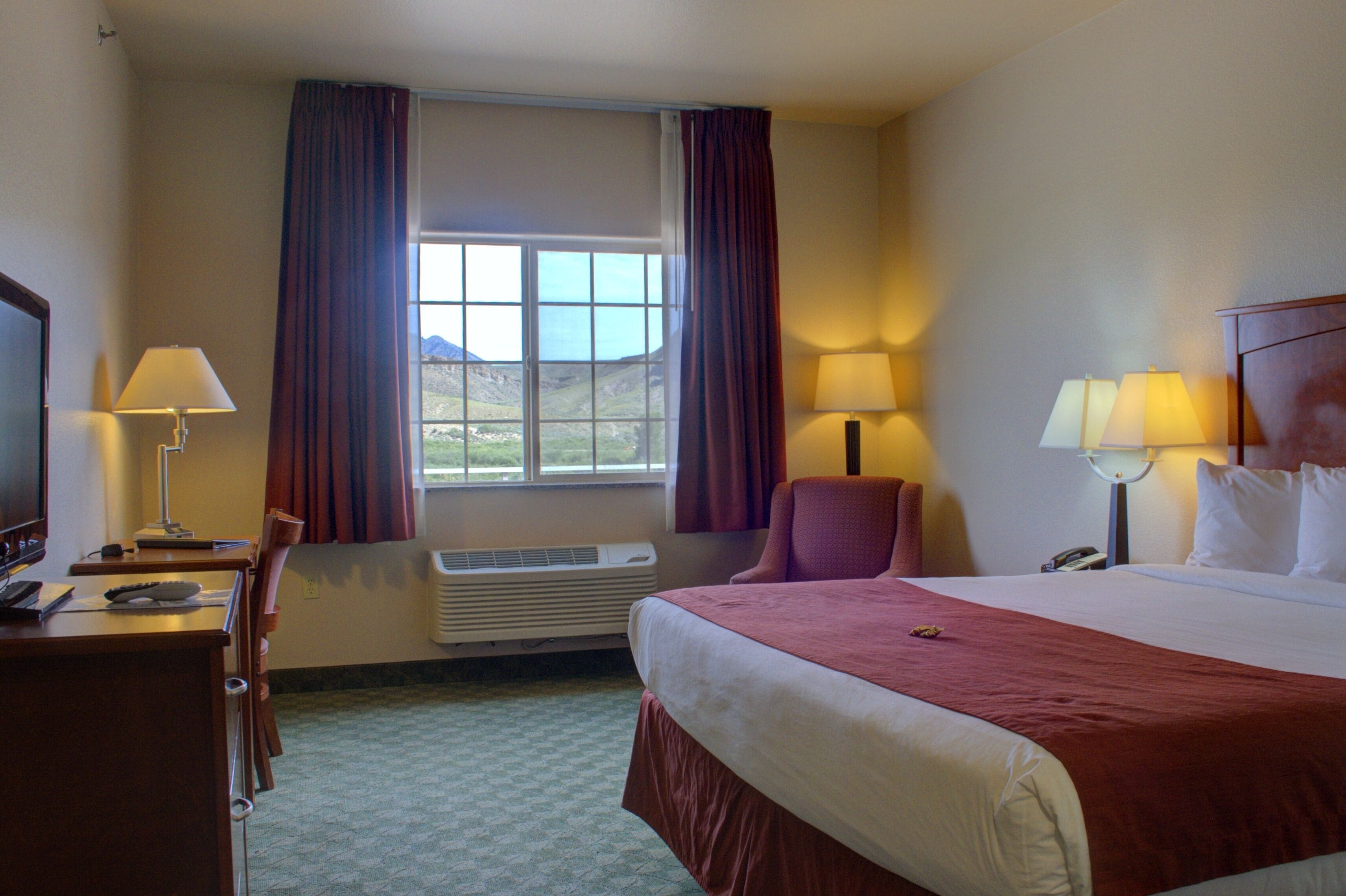 laptop workspace, blackout curtains, iron/ironing board