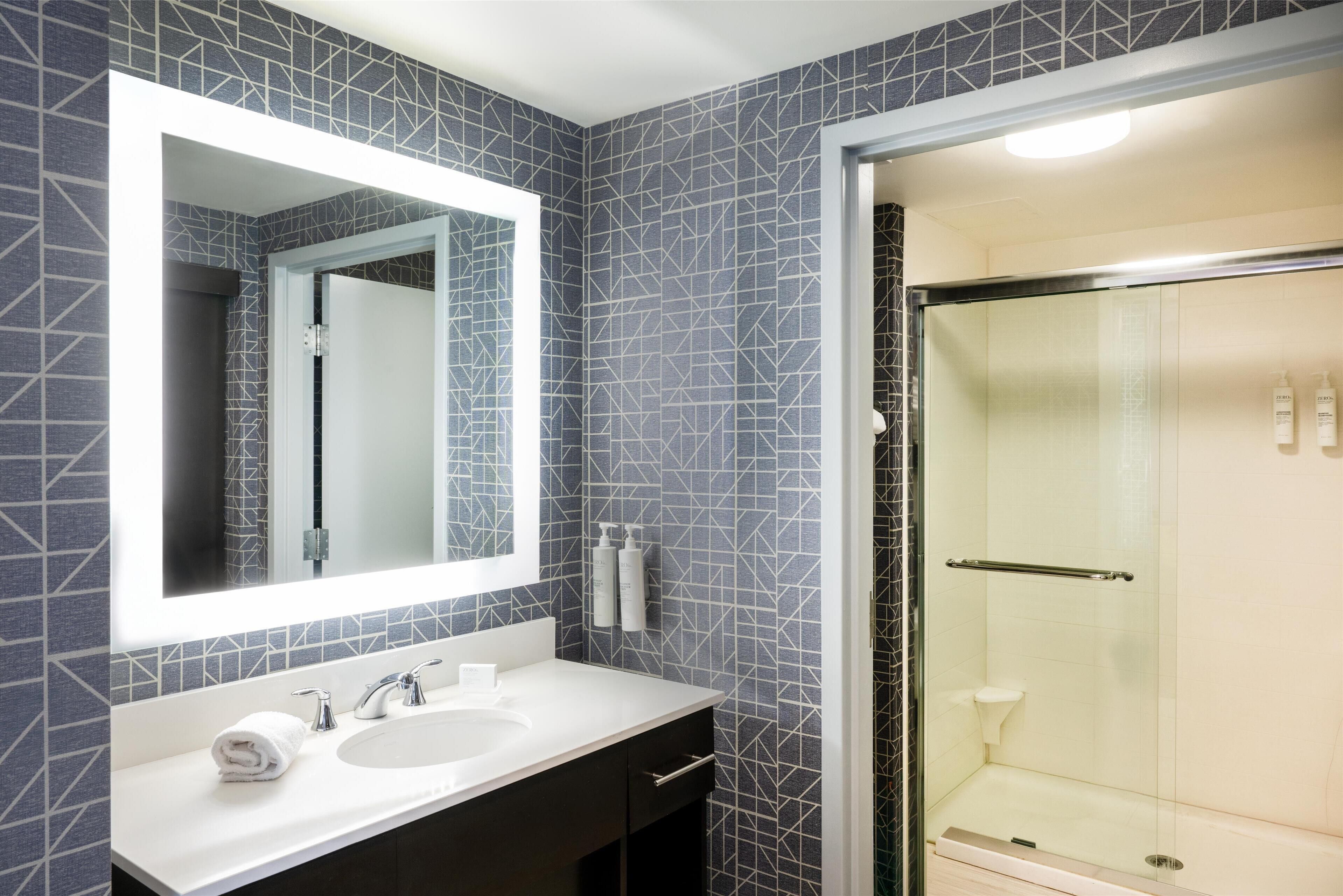 studio suite, 2 queen beds | bathroom shower