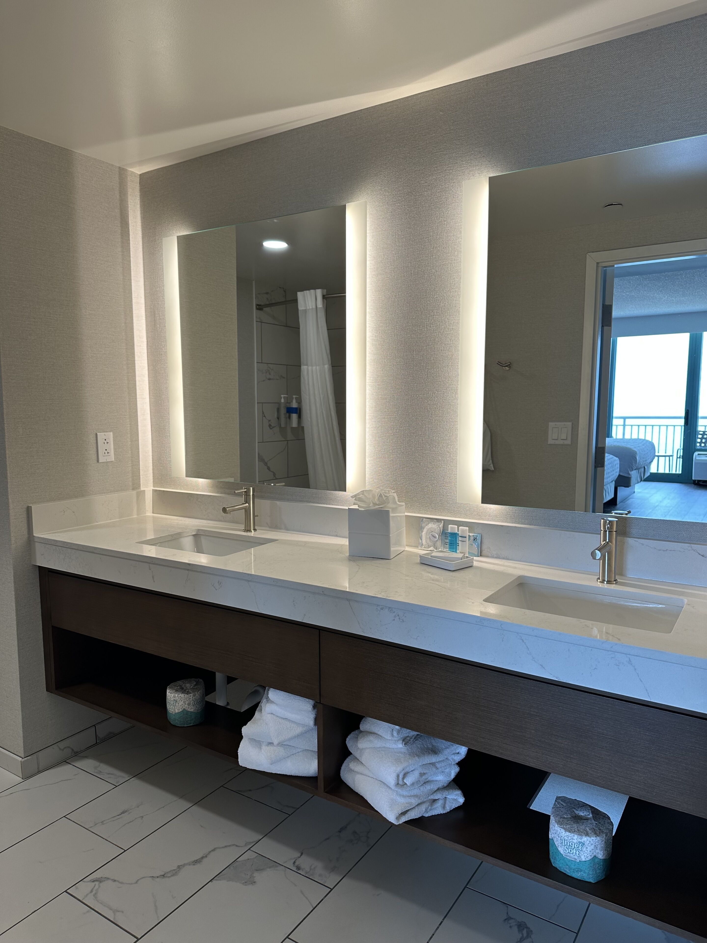oceanfront, 2 queen suite, 1 sofa bed, renovated | bathroom | combined shower/bathtub, rainfall showerhead, hair dryer, towels