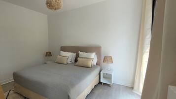 Departamento | Ropa de cama de alta calidad y caja de seguridad en la habitación