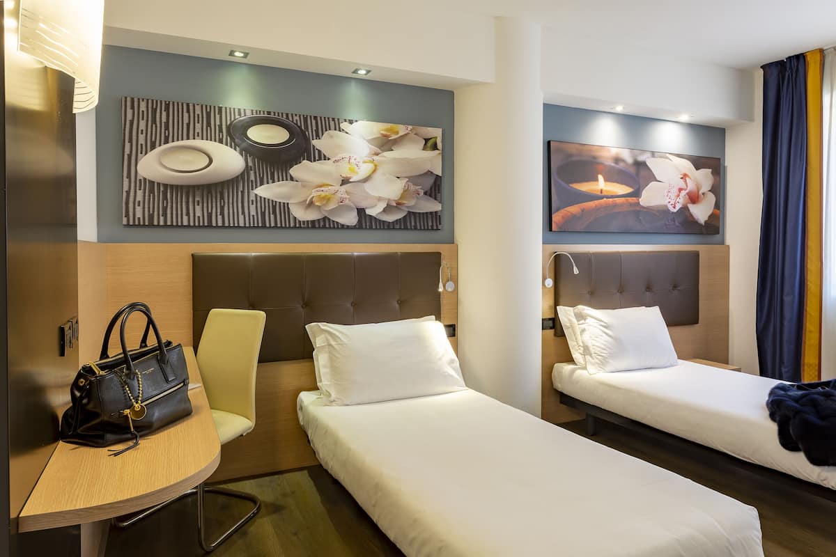 double room, 2 single beds | hypo-allergenic bedding, minibar, in-room safe, desk